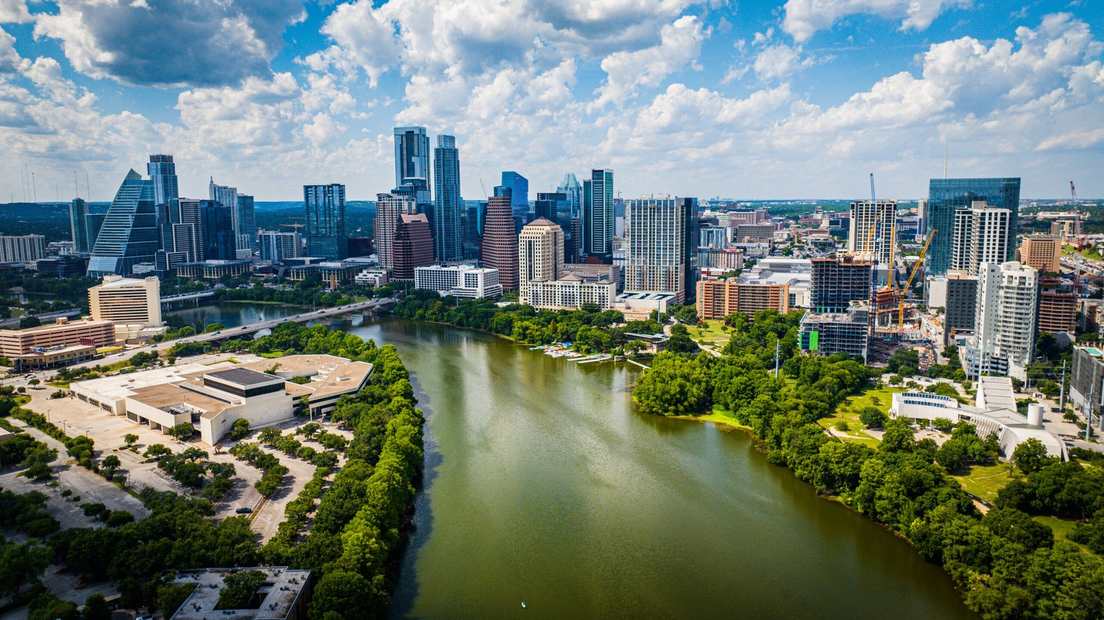 About Us 1 aerial view of downtown austin with modern buildin 2026 03 18 12 22 09 utc scaled